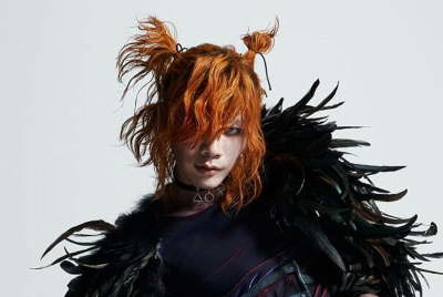 Kenshi Yonezu — POP SONG: orange-gold hair and black feather couture portrait